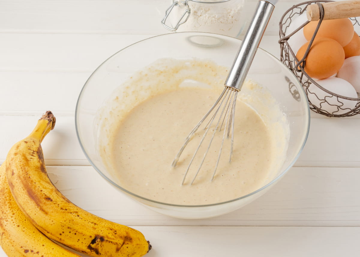 Whisking the wet pancake ingredients to make the batter